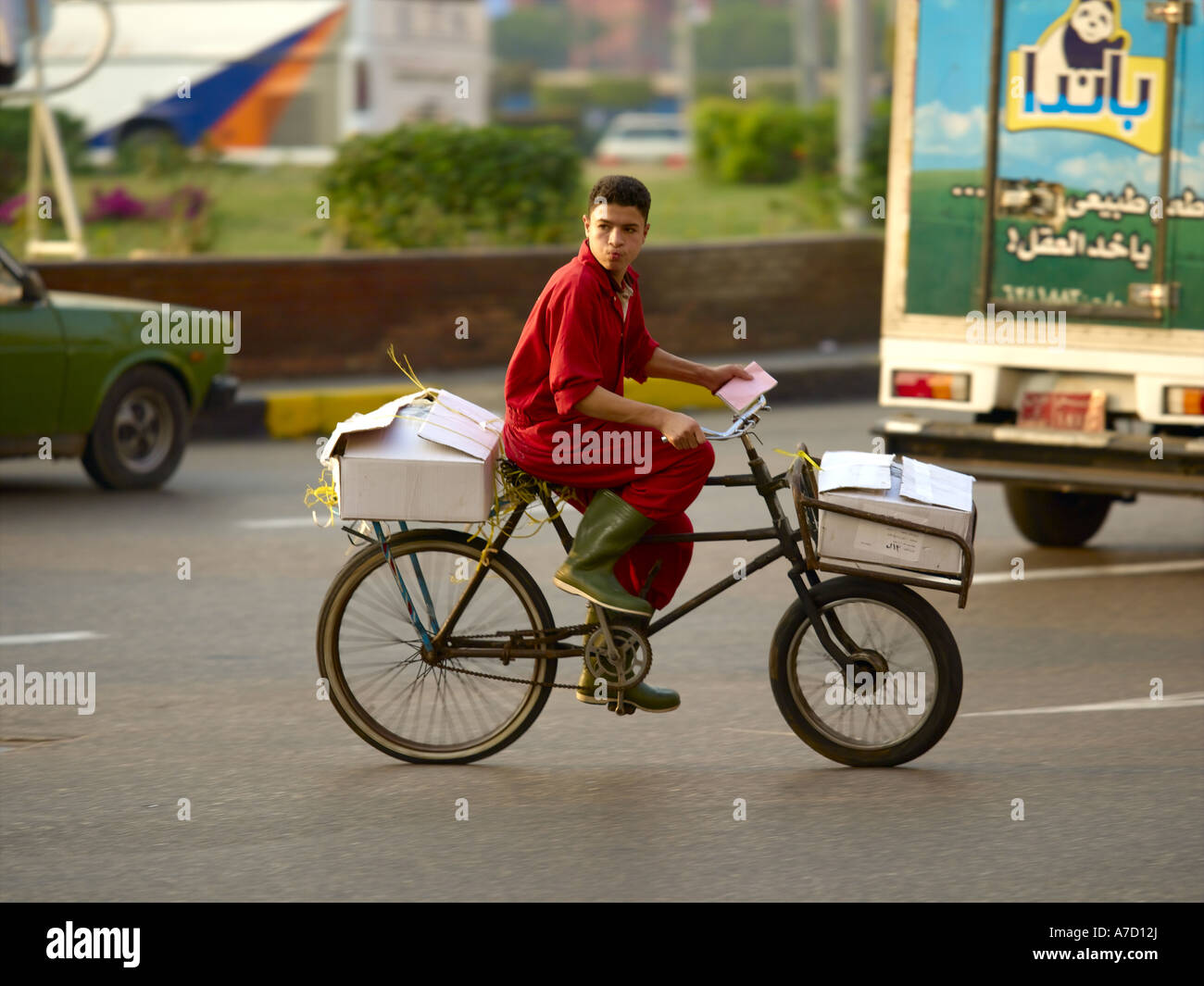 Traffic Chaos Around Midan Tahrir, Delivery Boy Stock Photo