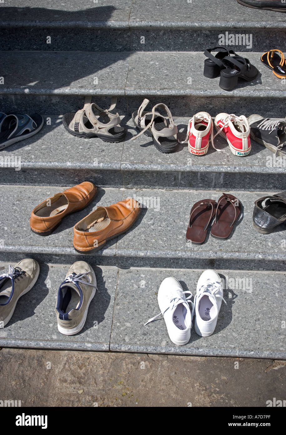 Shoes left outside Wat Paramaiyikawat Ko Kred Bangkok Thailand Stock