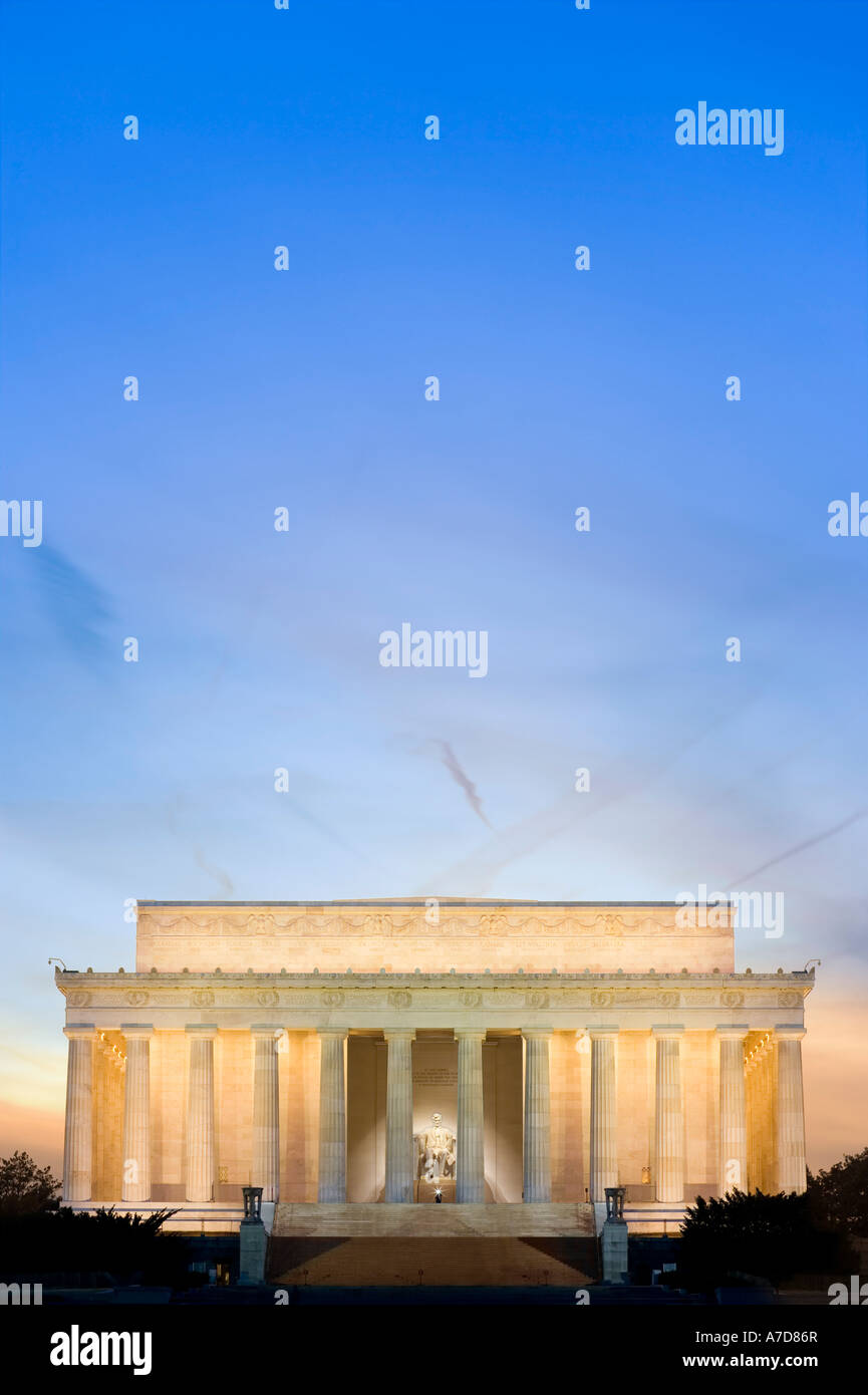 Washington DC Abraham Lincoln Memorial at sunset. A single photographer's flash can be seen right in front of the statue. Stock Photo