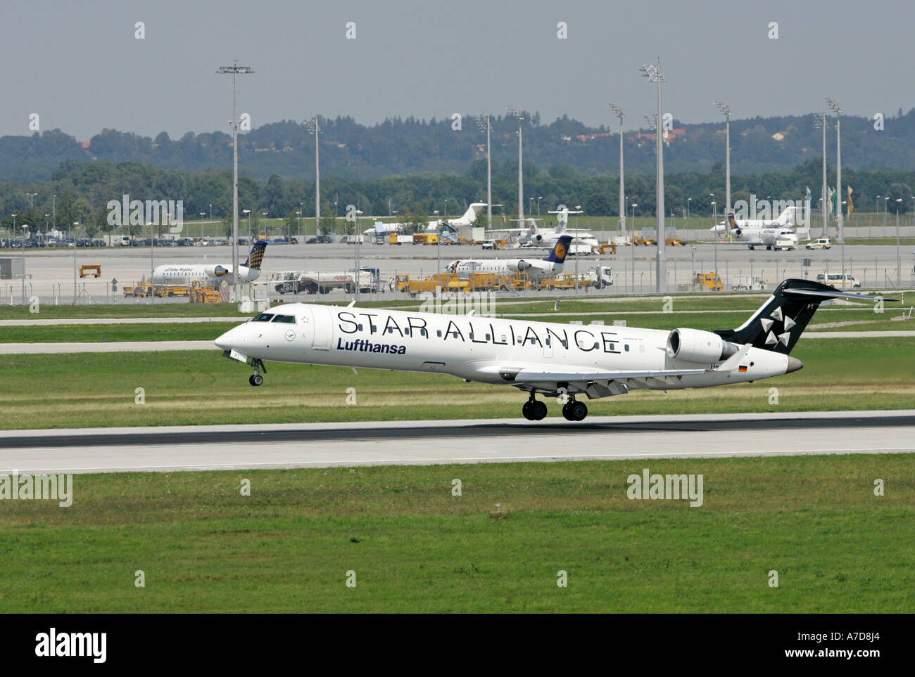 Munich, GER, 11. Aug. 2005 - A Lufthansa StarAlliance-Jet of type Canadair CRJ750 touch down at Munich Airport. Stock Photo