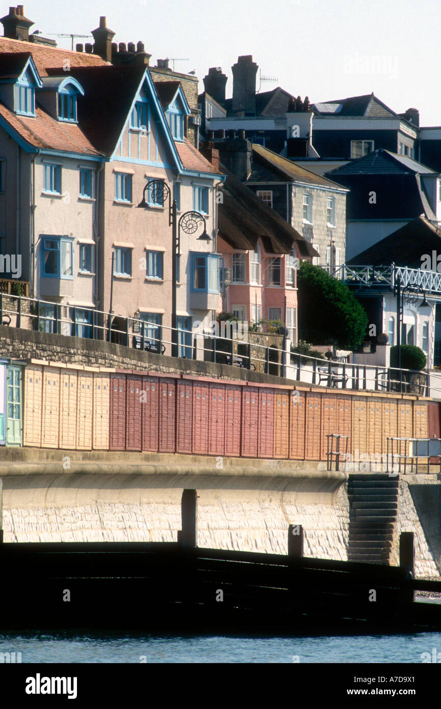 Houses and beach huts on the seafront at Marine Parade in Lyme Regis