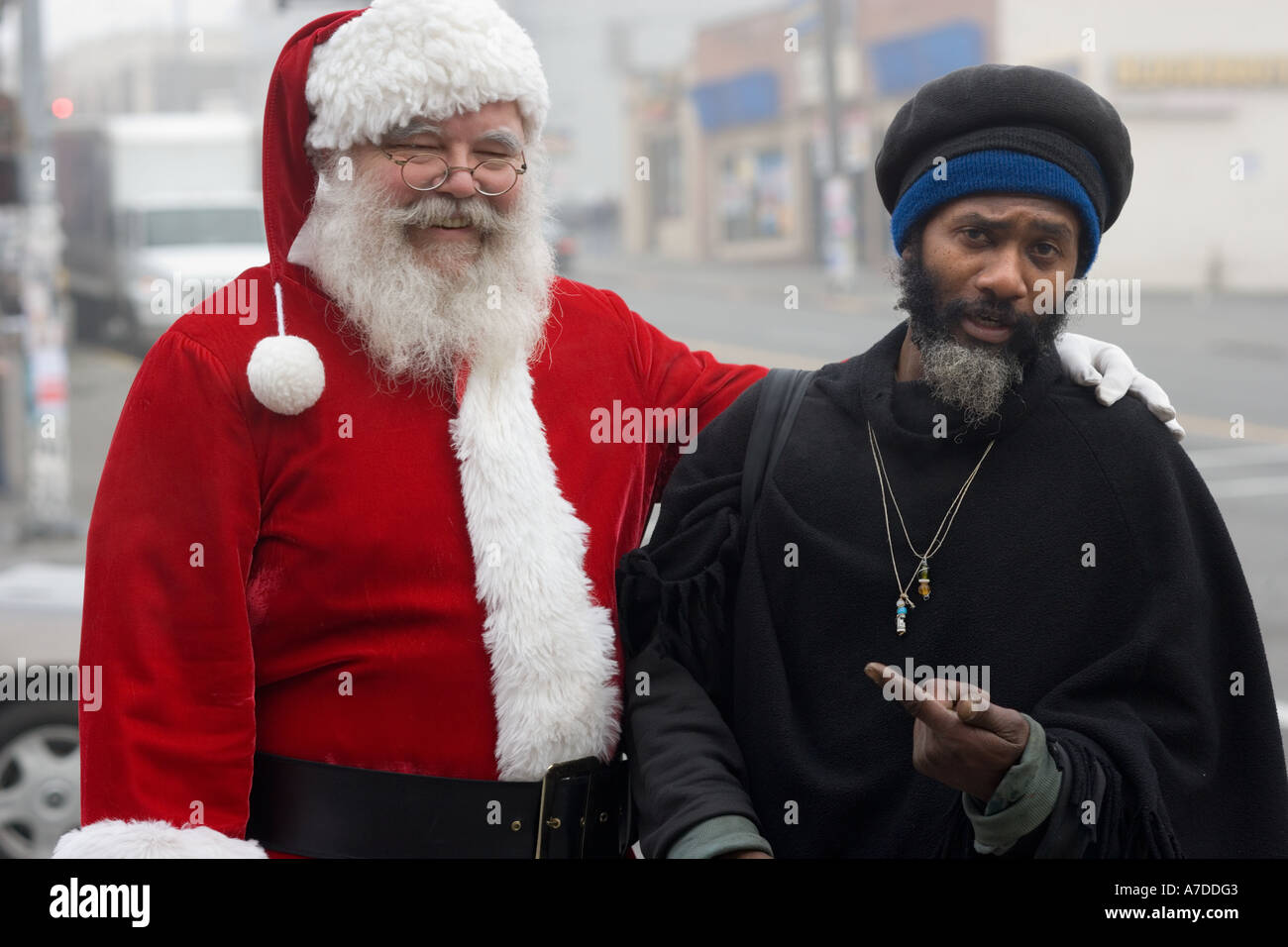 Santa Claus posing with street prophet Stock Photo