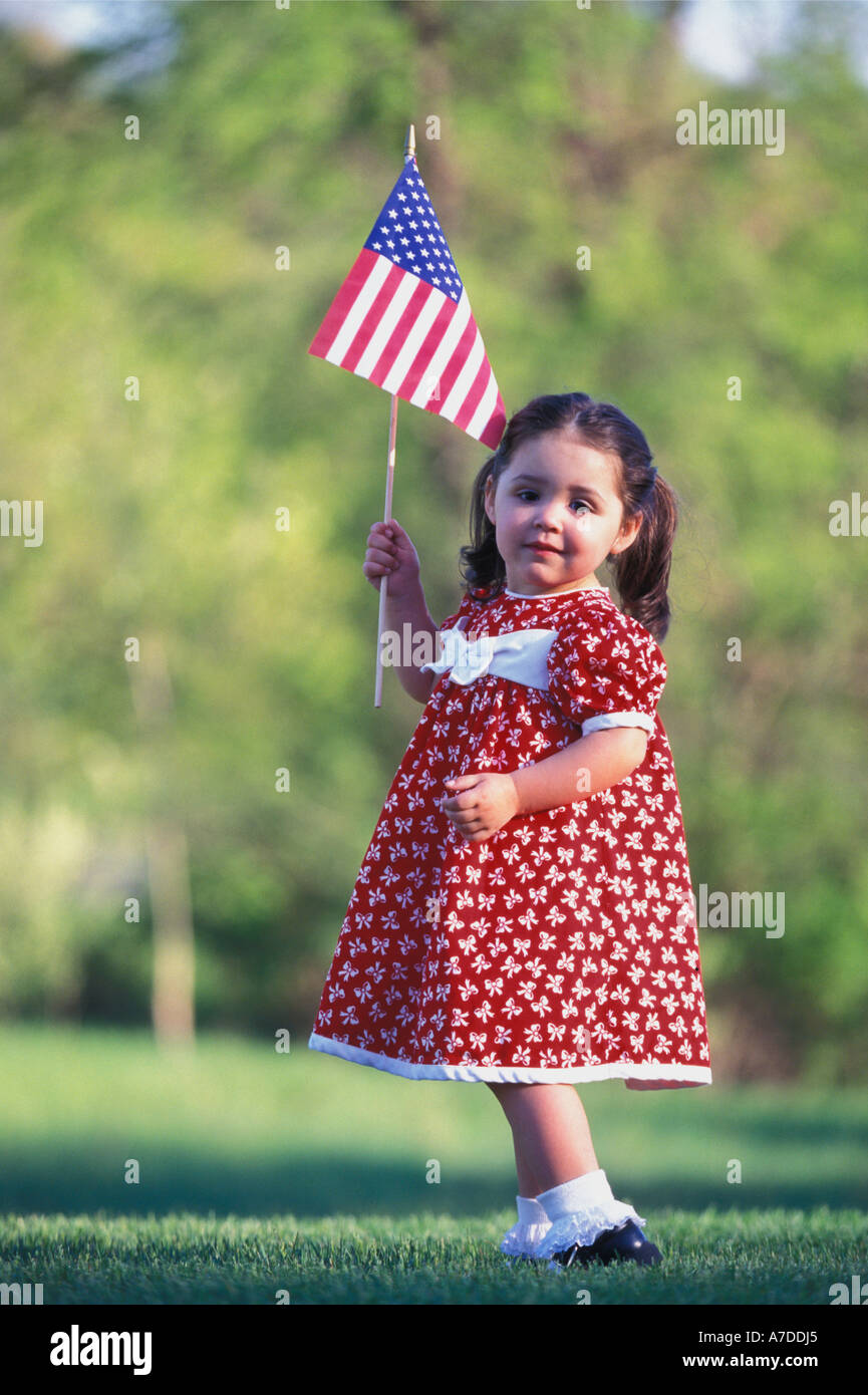 Little girl waving American flag Stock Photo - Alamy