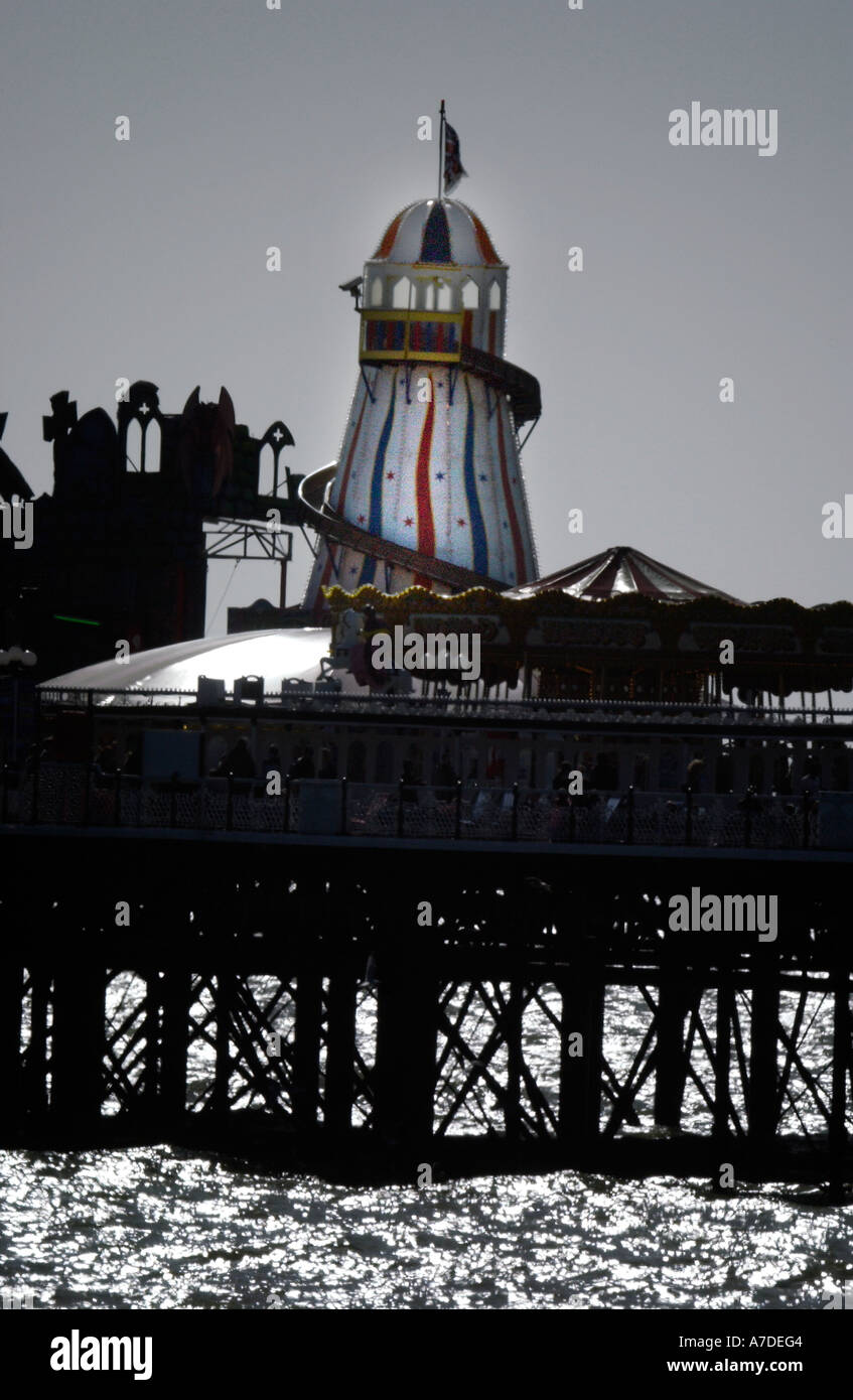 The Helter skelter on Brighton Palace Pier also known as Brighton Pier on a calm sunny evening in spring. Stock Photo