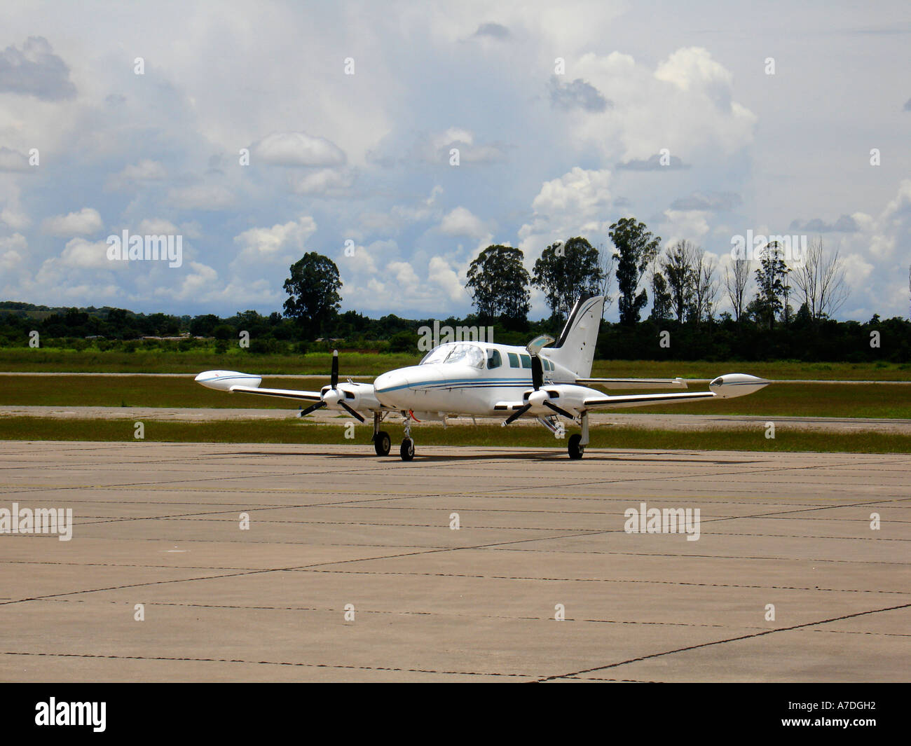 Small airplane with open door at small Ndola airport in Zambia Stock Photo