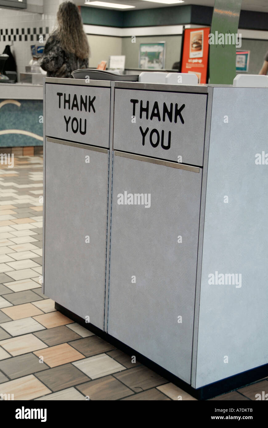 Trash Receptacles With Thank You Written On The Outside At A