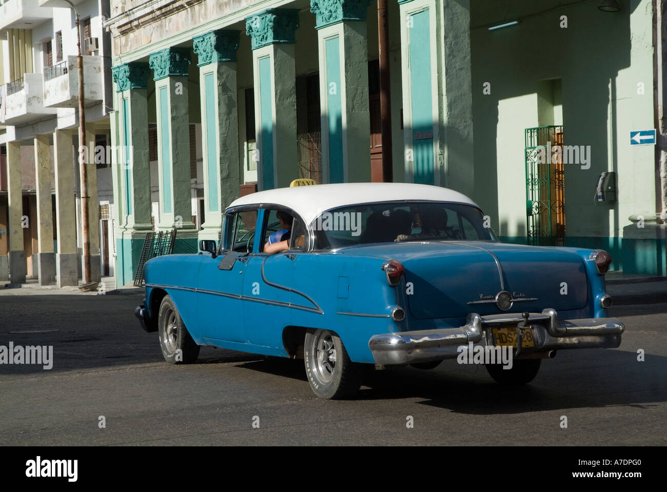 Classic American car taxi driving in Havana streets Cuba Stock Photo