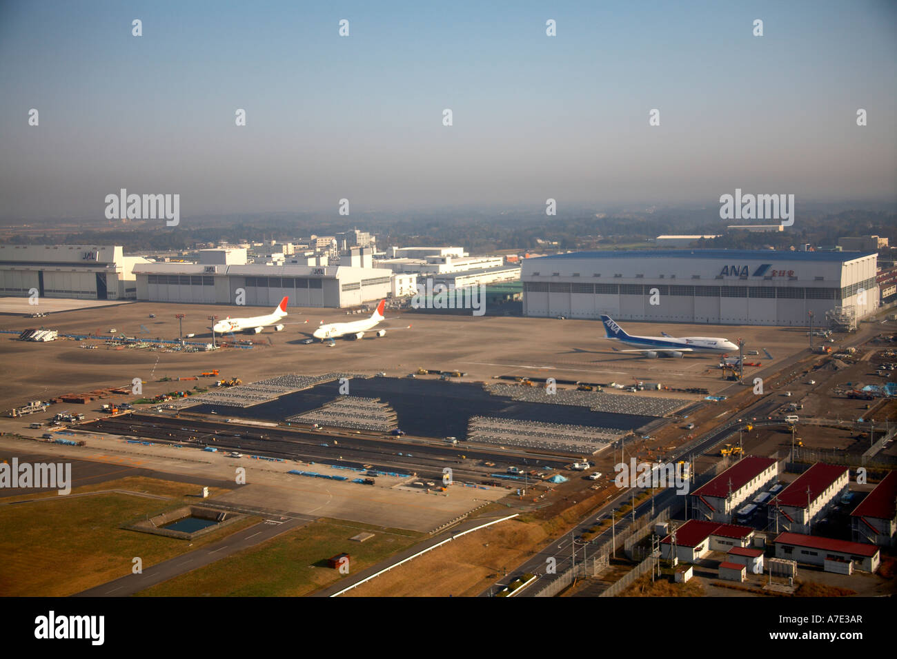 High level oblique aerial view of Narita Airport with aircraft and runways Tokyo Japan Asia Stock Photo