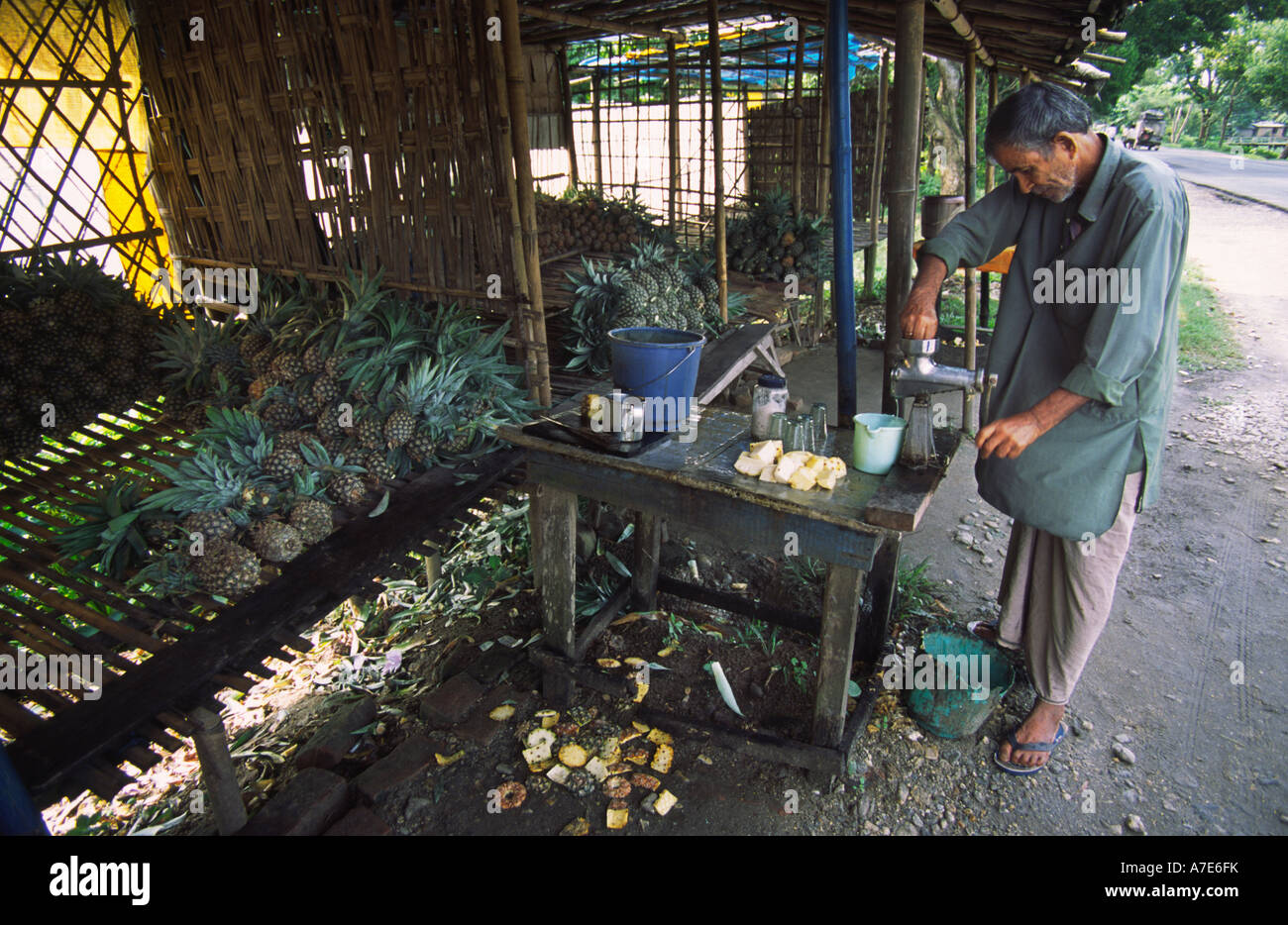 Pineapple juice stall on the side of the road, West Bengal, India Stock Photo