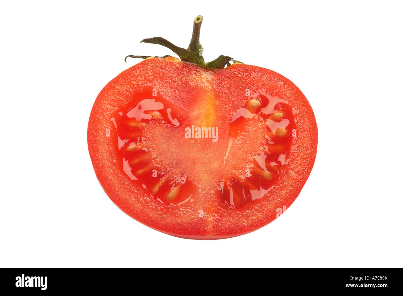 Tomato cut in half Stock Photo Alamy