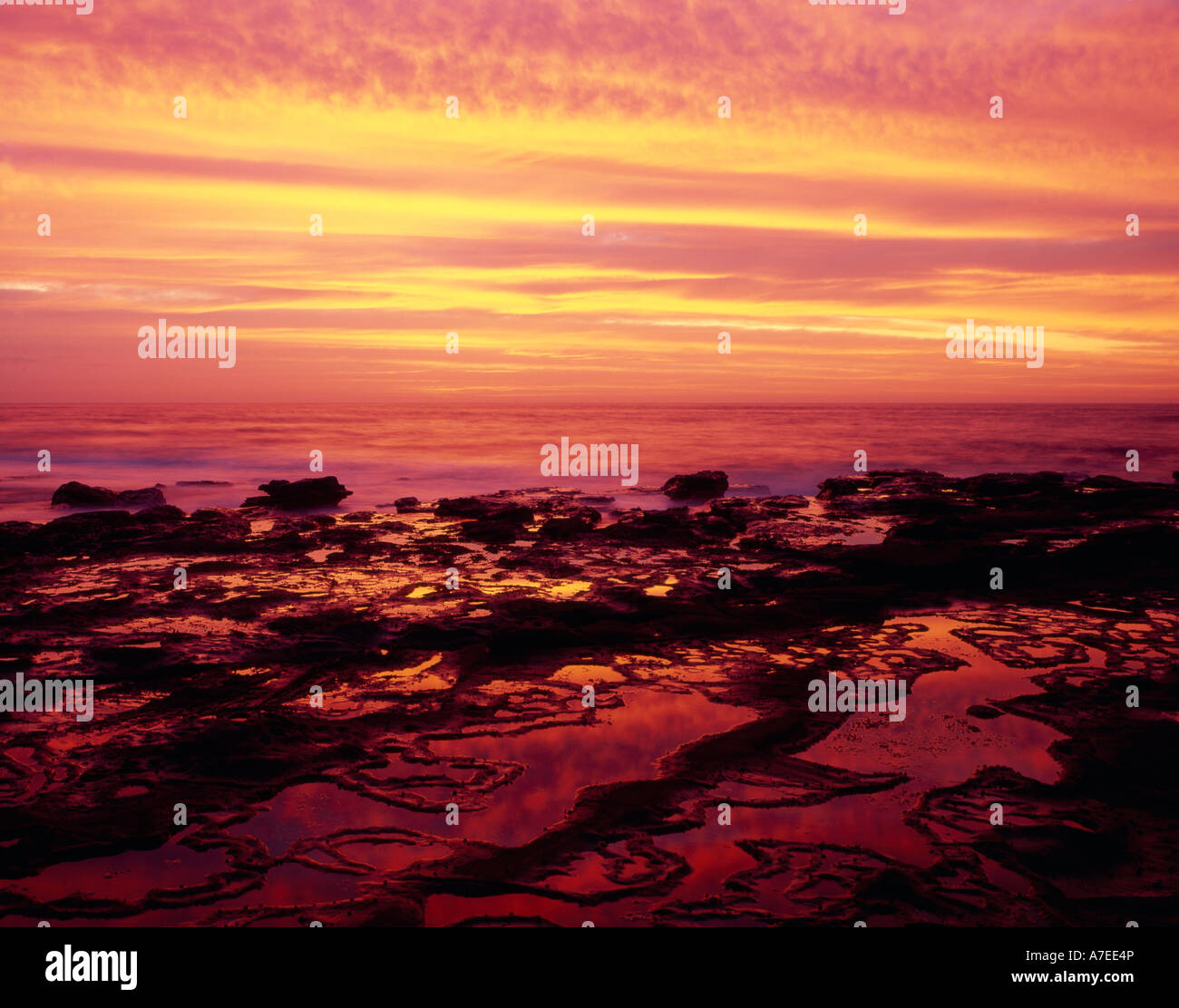 Firesky dawn, Coalcliff, NSW Australia Stock Photo