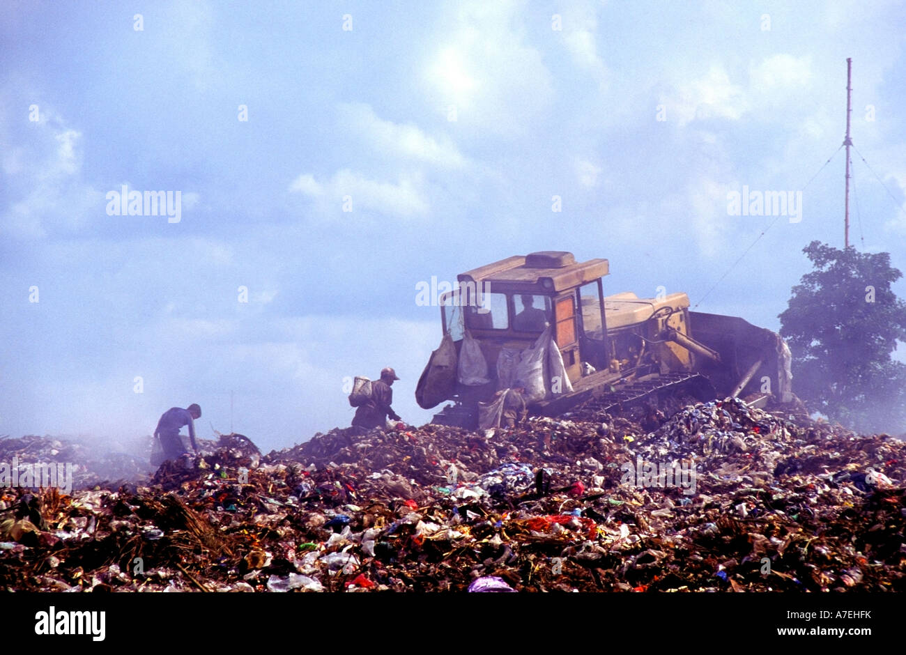 Bulldozer working on Phnom Penh s Steung Meanchey rubbish dump Stock Photo