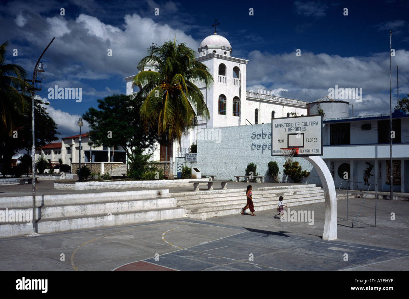 Parque Central and curch on the island of Flores in Lago Petén Itzá in the North of Guatemala. Stock Photo
