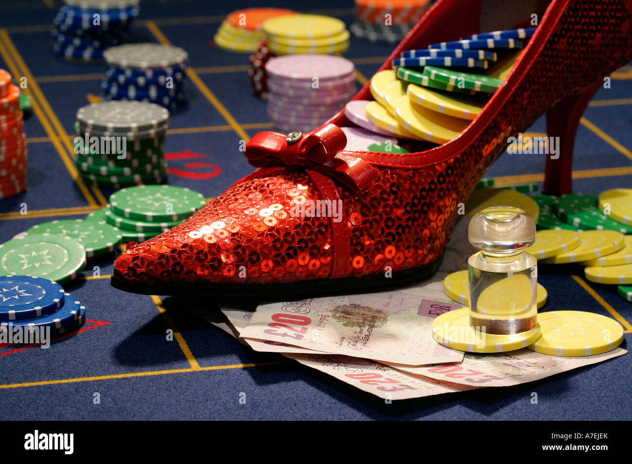 casino roulette gambling dolly chip money close up detail lady shoe Stock  Photo - Alamy