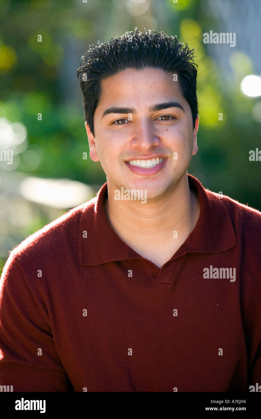 Portrait of 25  year  old  Indian man  outside Stock Photo 