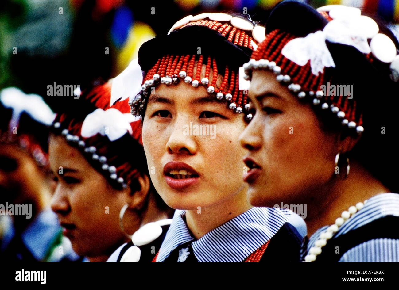 Lisu women wearing traditional clothing at a festival dancing Stock