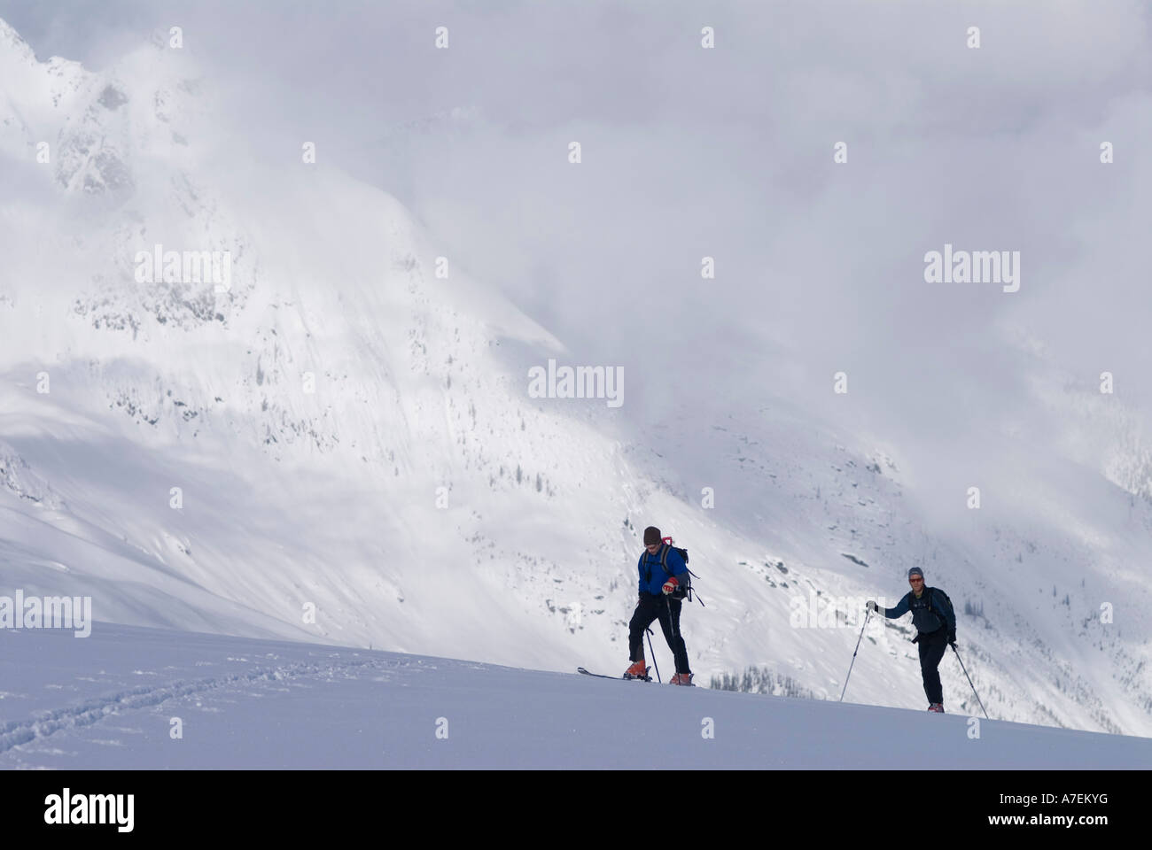 Skiers skinning up the Asulkan Glacier, Rogers Pass area, Selkirk Mountains, Canadian Rockies, British Columbia, Canada Stock Photo