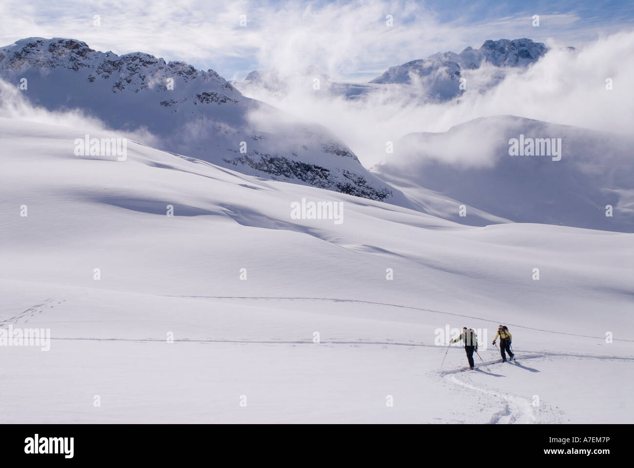 Skiers skinning on The Illicilliwaet Glacier, Rogers Pass area, Selkirk Mountains, Canadian Rockies, British Columbia, Canada Stock Photo