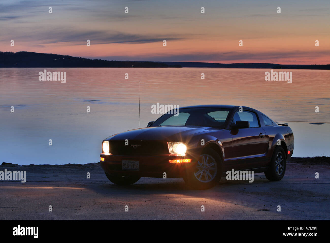 Ford Mustang Sports Car at Sunrise at Lake Superior Stock Photo