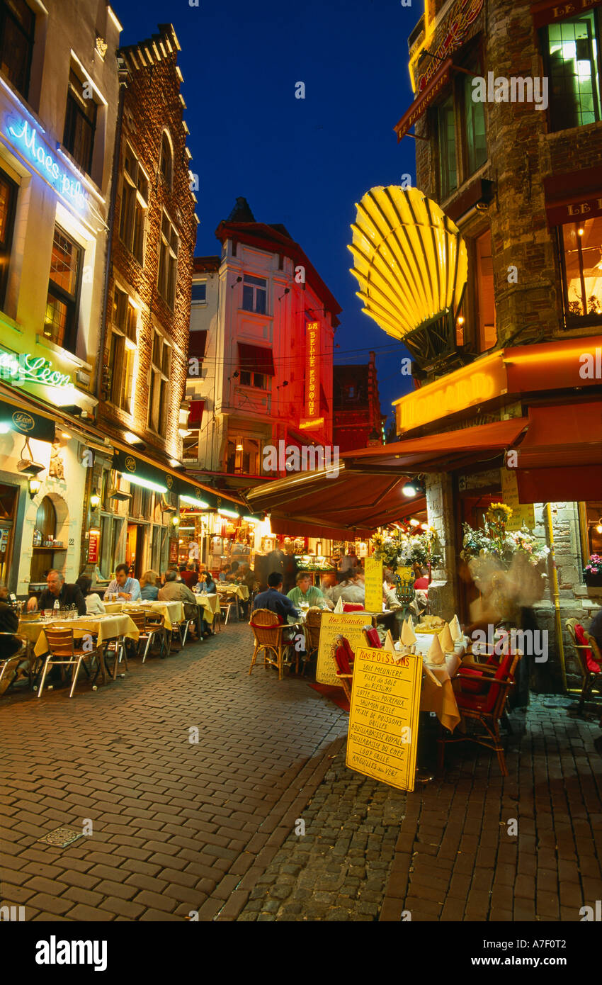 restaurants in Rue des Bouchers at dusk Brussels Belgium Stock Photo
