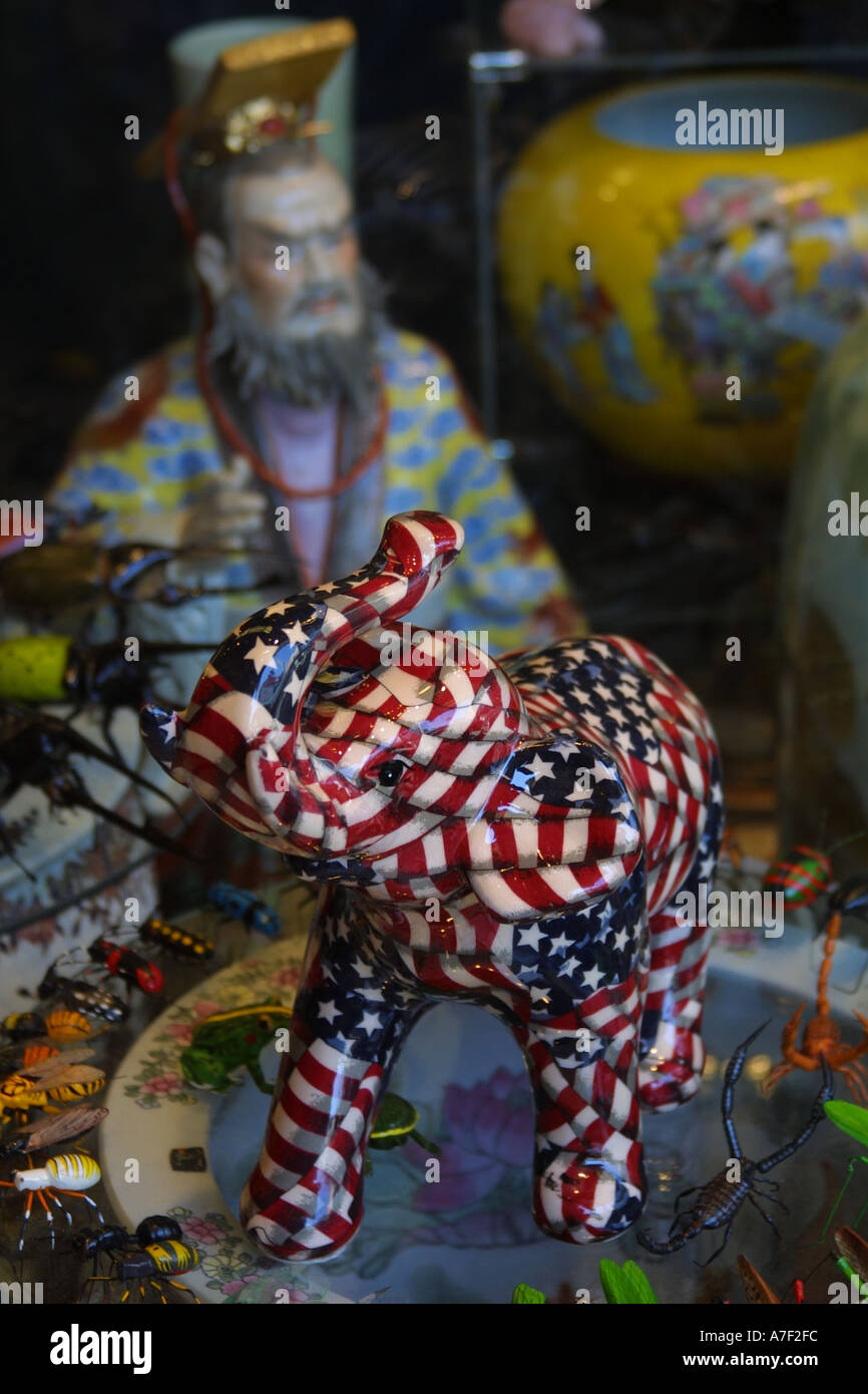 Elephant sculpture painted with USA flag in red white blue on display in China Town shop in San Francisco California Stock Photo