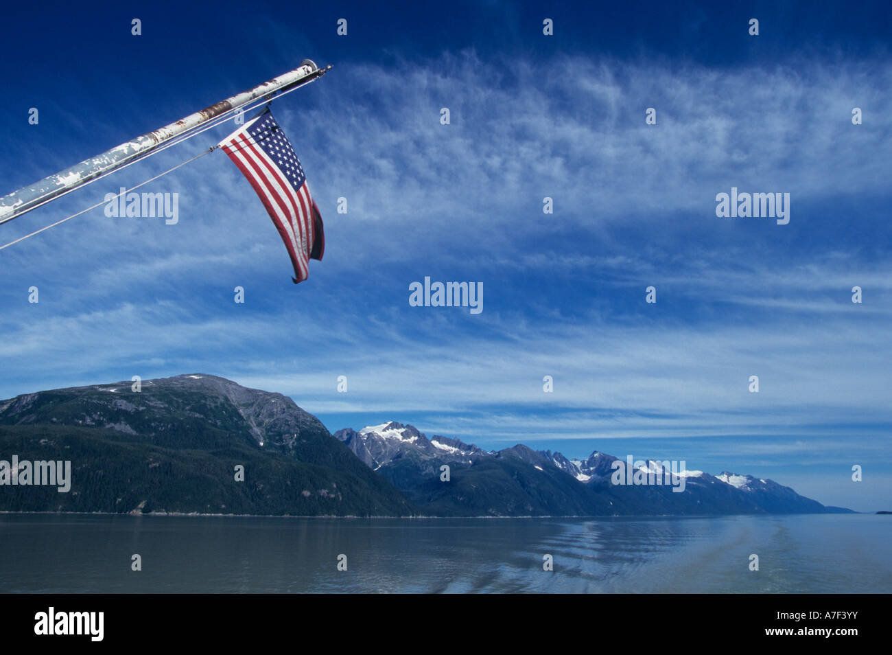 USA Alaska Inside Passage Flag flies from Alaska State Ferry sailing