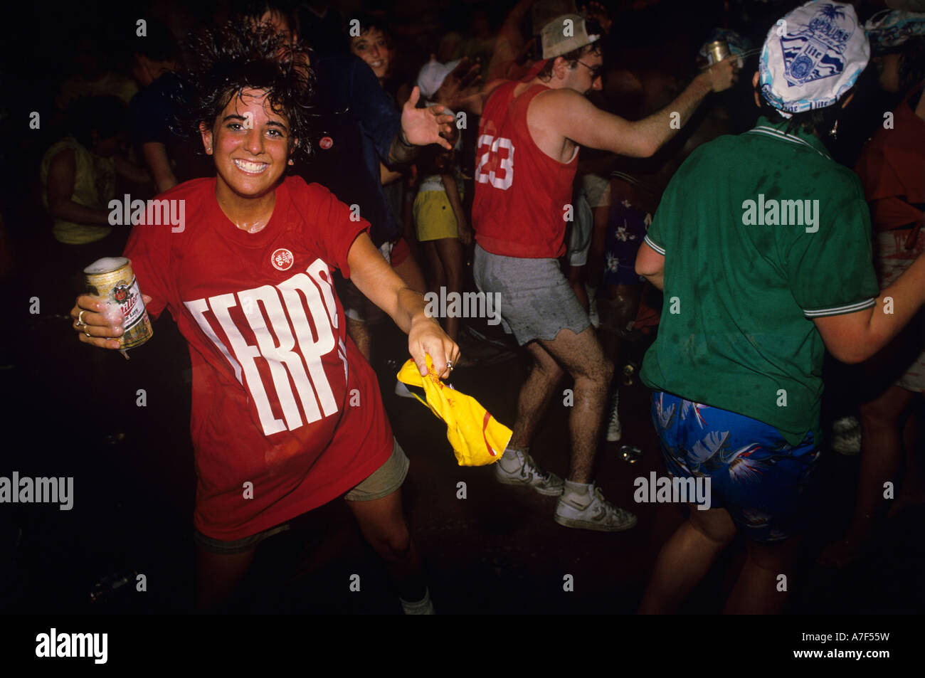 USA Florida College student dances with beer in hand at The Button bar