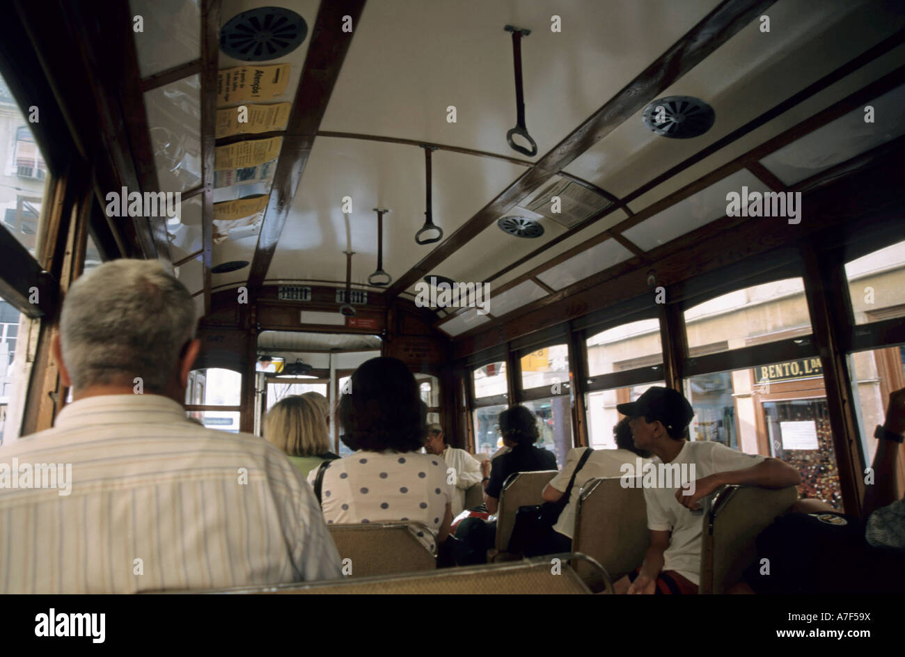 Passengers inside tram number 28 Lisbon Portugal Stock Photo