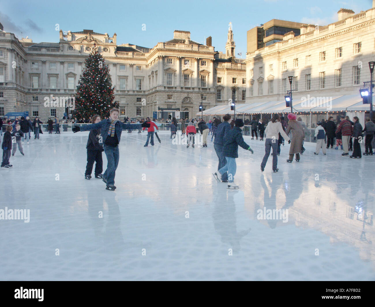 The christmas tree ice rink at somerset house in london hi-res stock ...