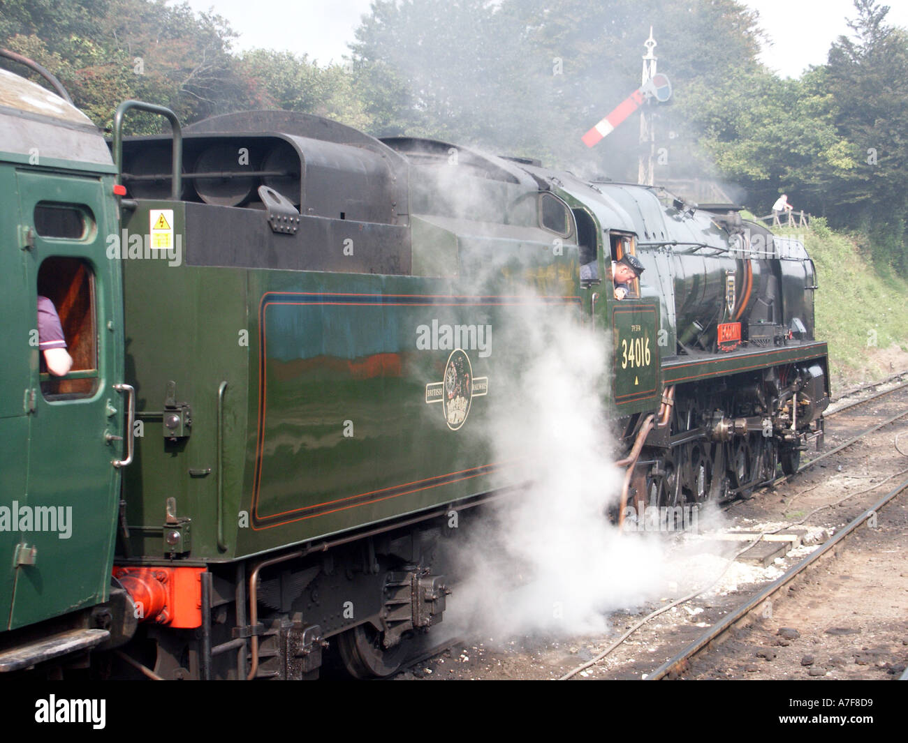 Preserved restored steam engine 34016 at Ropley Station on Watercress Line part of Mid Hants preserved & restored railway Hampshire England UK Stock Photo