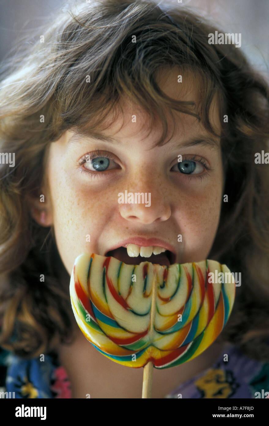 Detroit Michigan Mariel West 9 eats a large lollipop Stock Photo