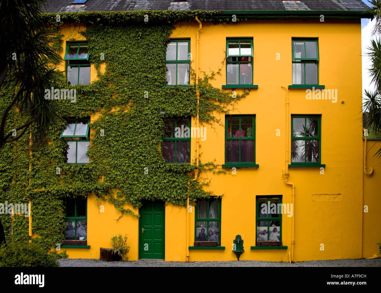 Colourfully painted side of Quills shop in Glengarriff Stock Photo