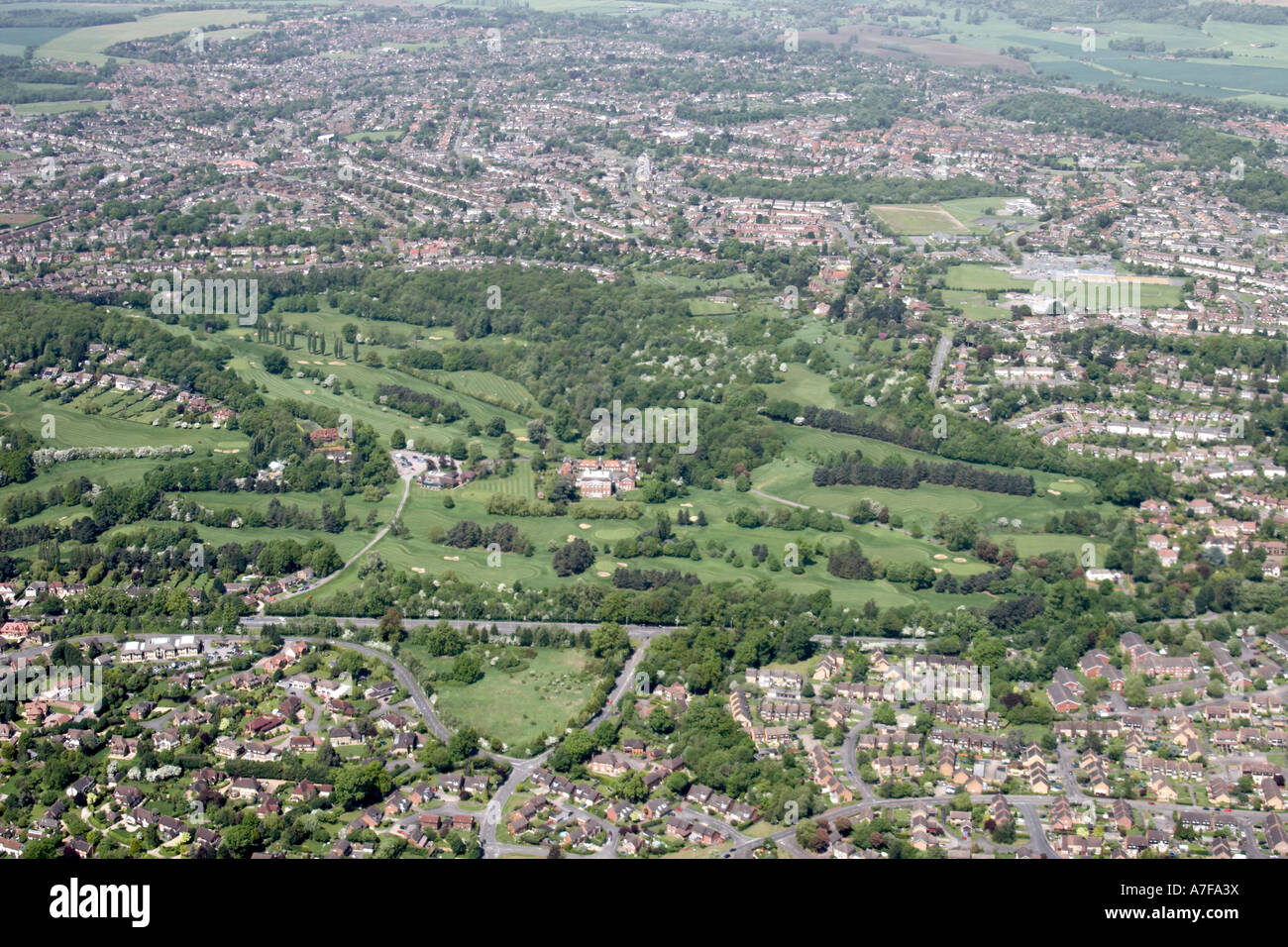 High level oblique aerial view north west of Calcot Park Golf Club in