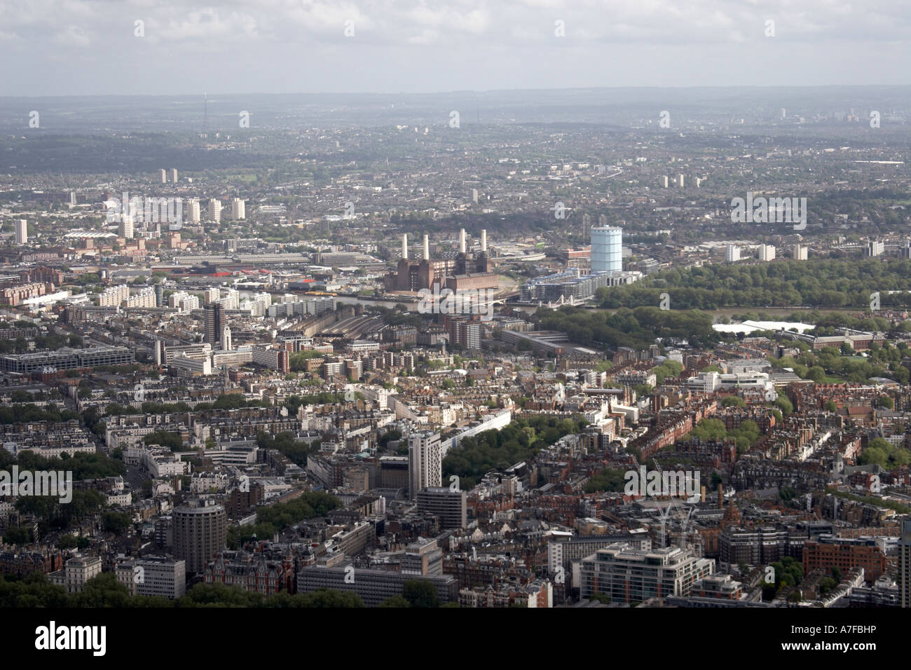 High level oblique aerial view south east of Battersea Power Station gas tank Battersea Park train depot  City of London Chelsea Stock Photo