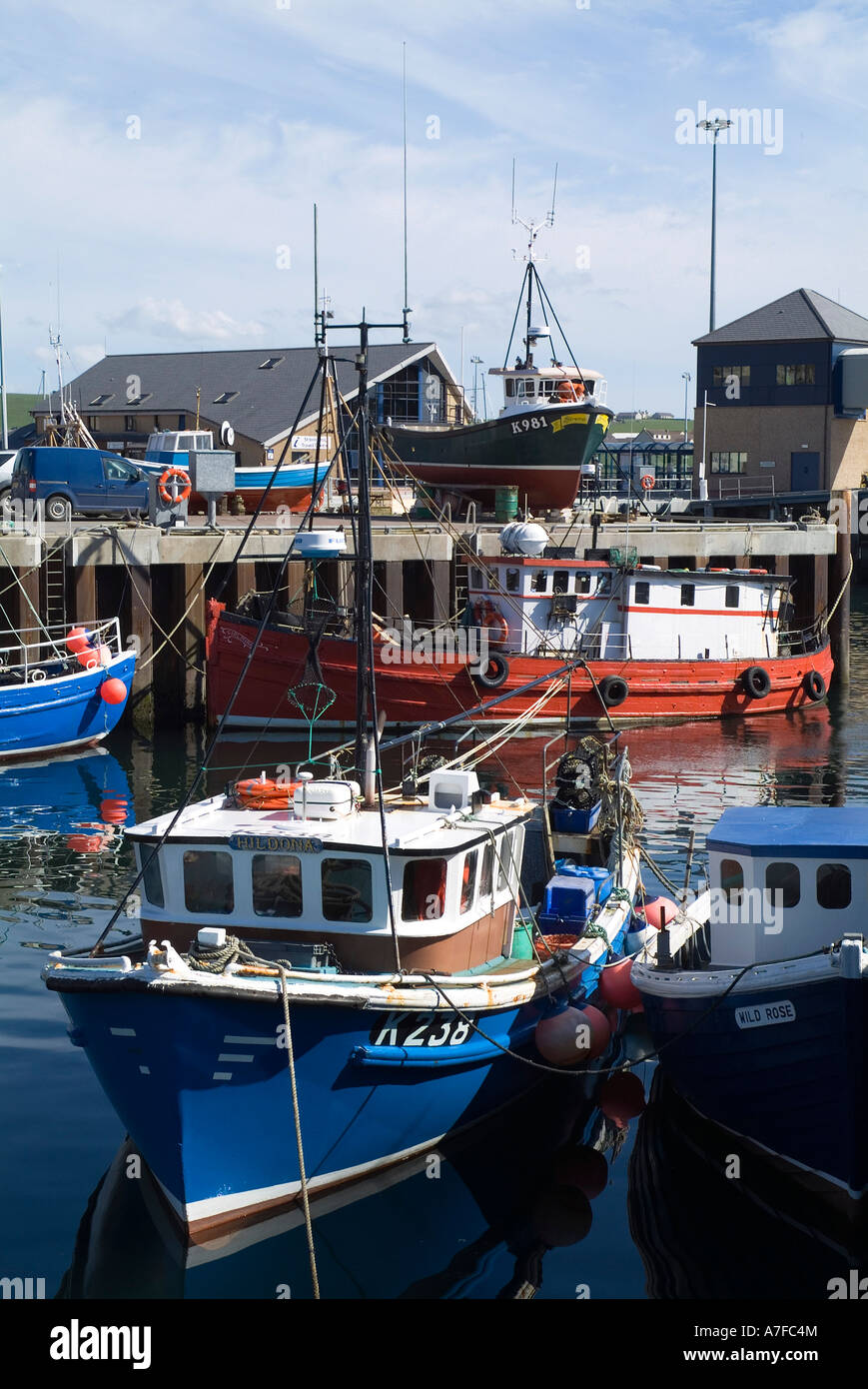 dh Harbour STROMNESS ORKNEY Fishing boats berth at quayside fishingboats port quay Stock Photo
