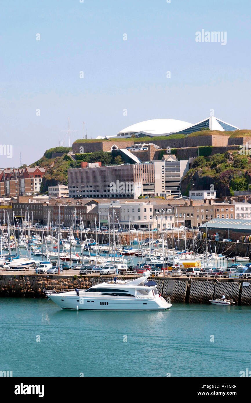 A motor cruiser finishes refuelling in St. Helier Harbour, Jersey Stock Photo