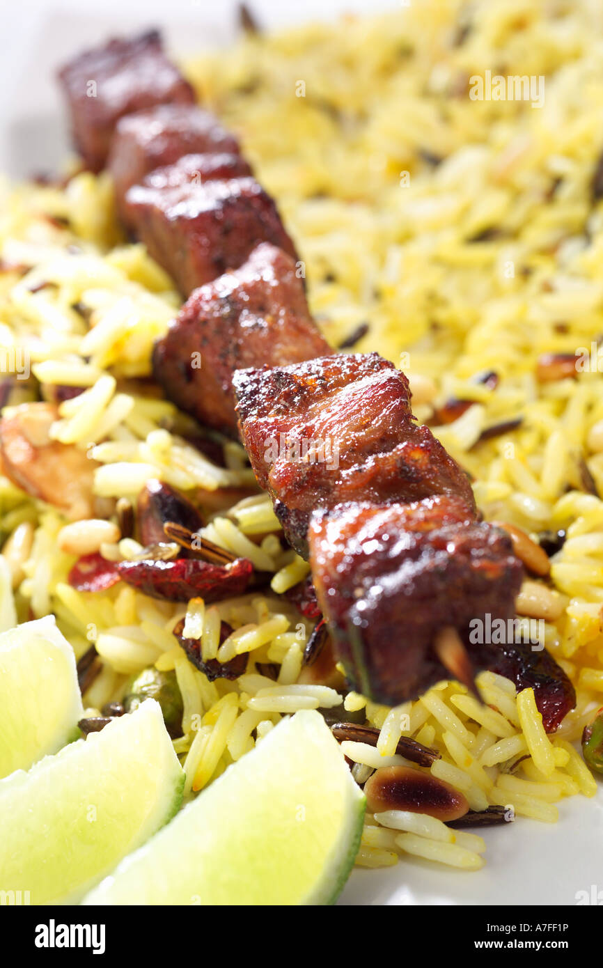 Lamb Kebab with saffron rice and lime Stock Photo Alamy