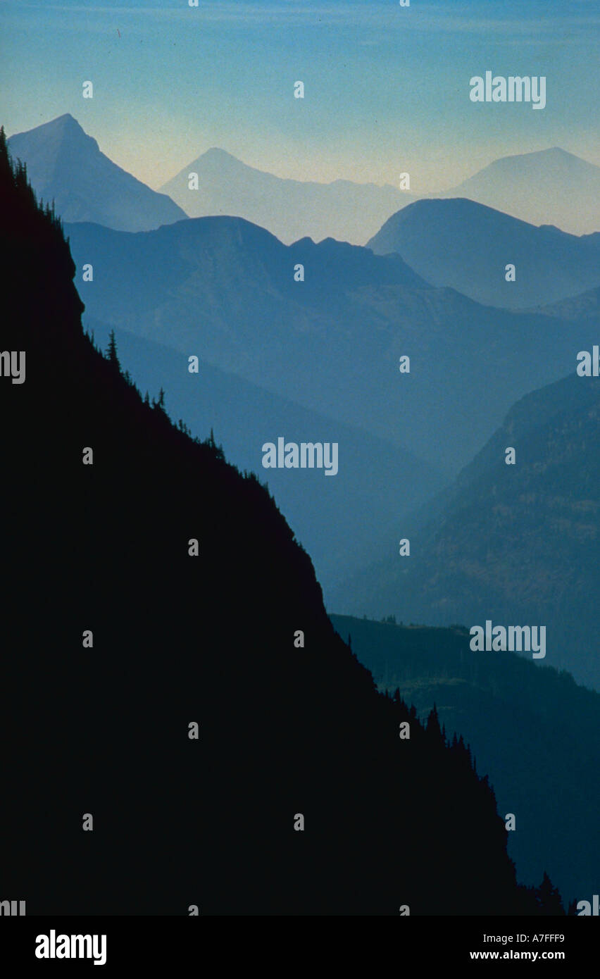 Mountain canyon side and receding peaks Glacier National Park Montana Stock Photo