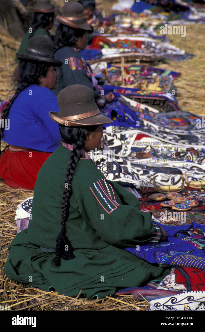 Peru, Lake Titicaca, Uros Floating Islands, blanket vendors Stock Photo