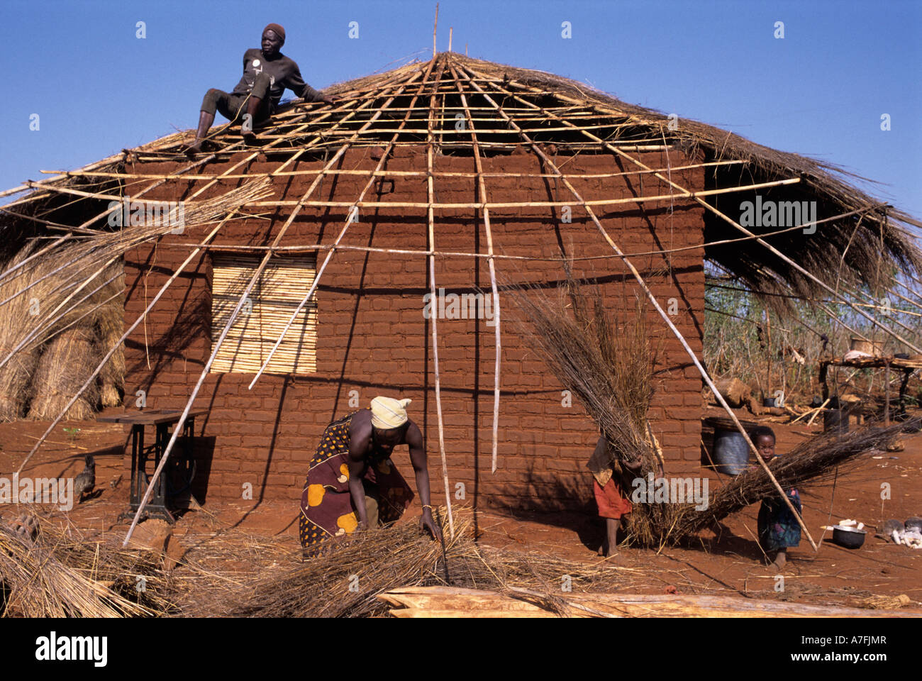 Africa.Mozambique Family house building with mud and thatch Stock Photo