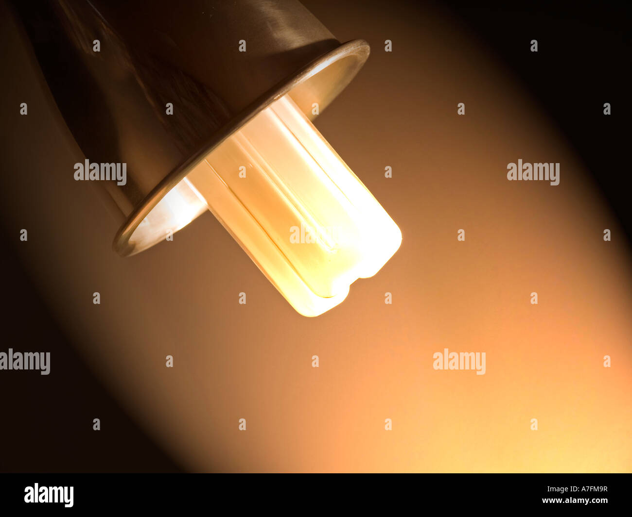 glowing energy saving lamp bulb Stock Photo - Alamy