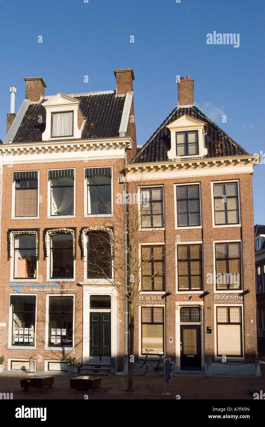 Facades of apartment houses with blue sky background Leeuwarden