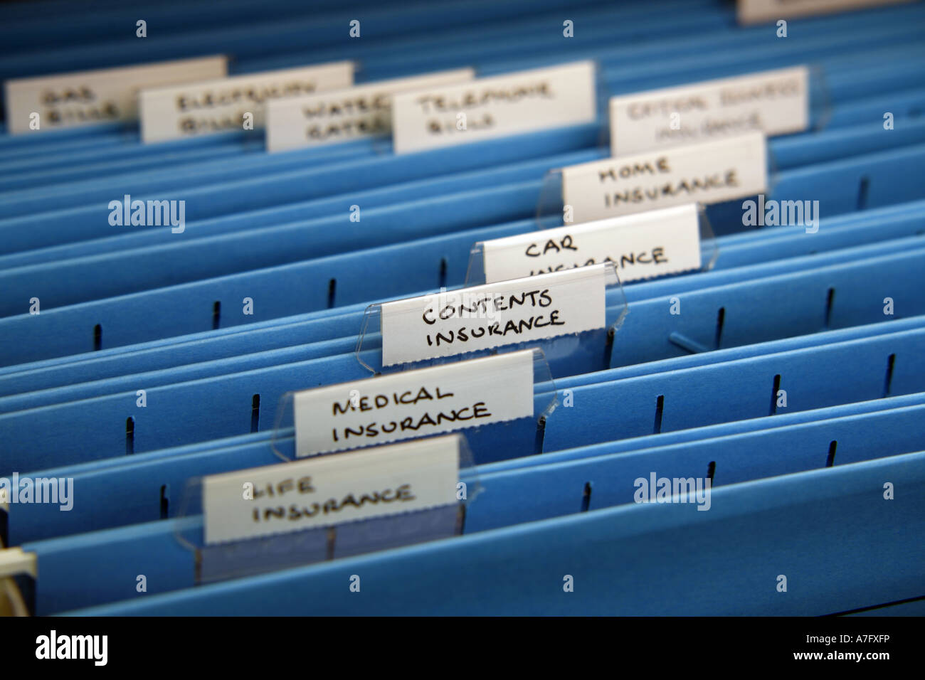 Home Filing with various insurance tabs Stock Photo Alamy