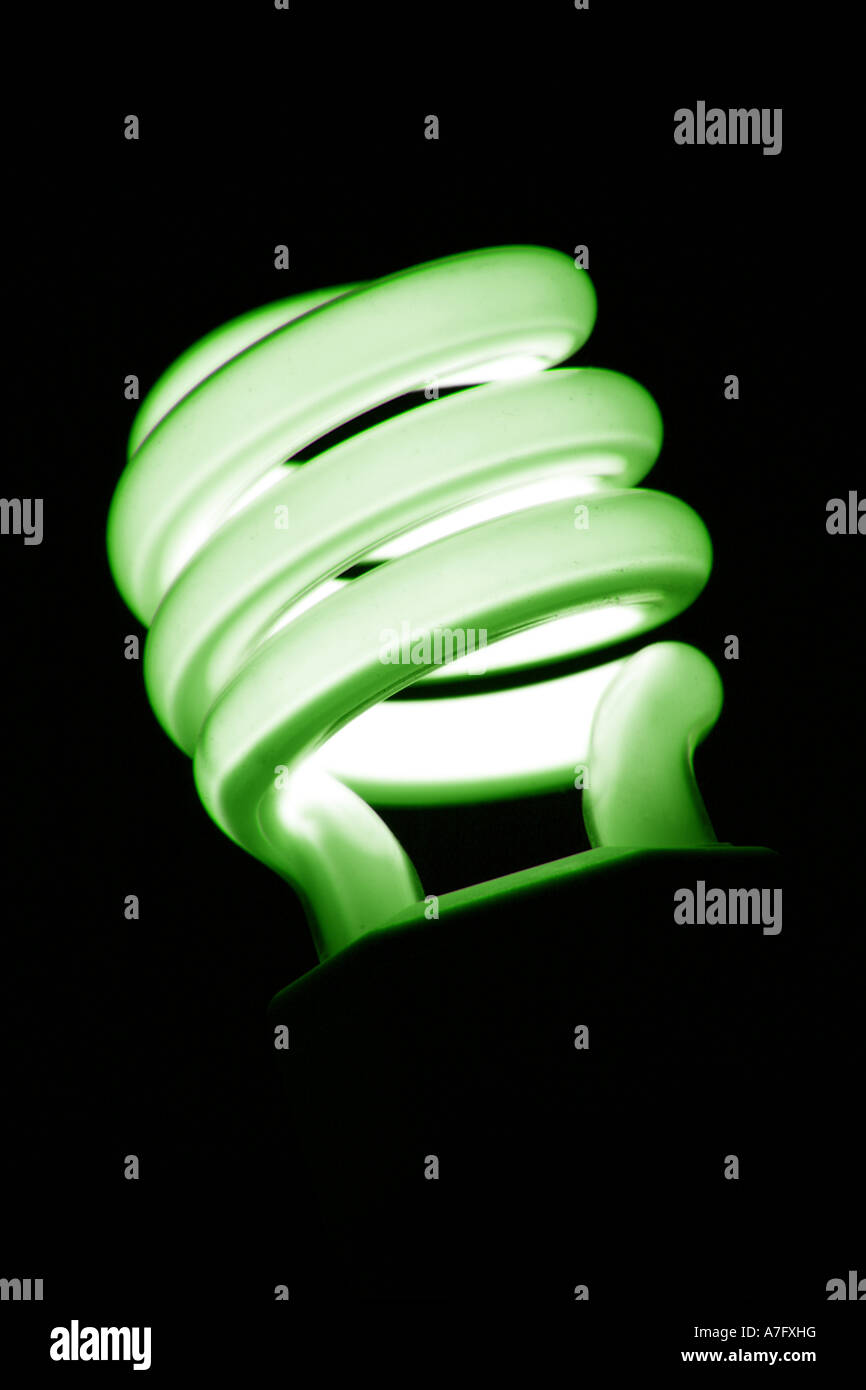 Glowing Energy Efficient Fluorescent Bulb Glowing Green Stock Photo - Alamy