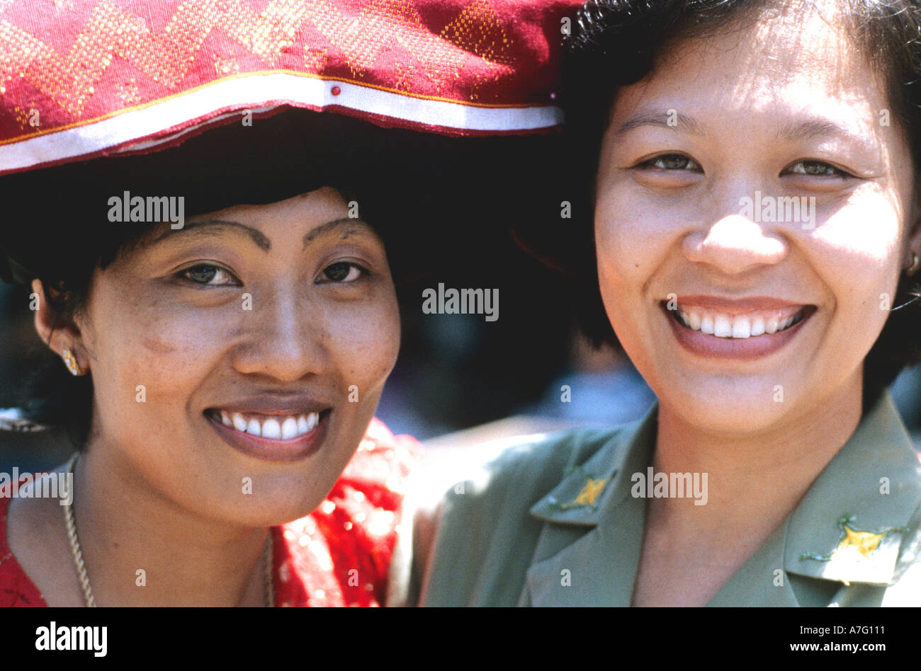 Two Indonesian girls one in traditional dress Java Stock Photo - Alamy