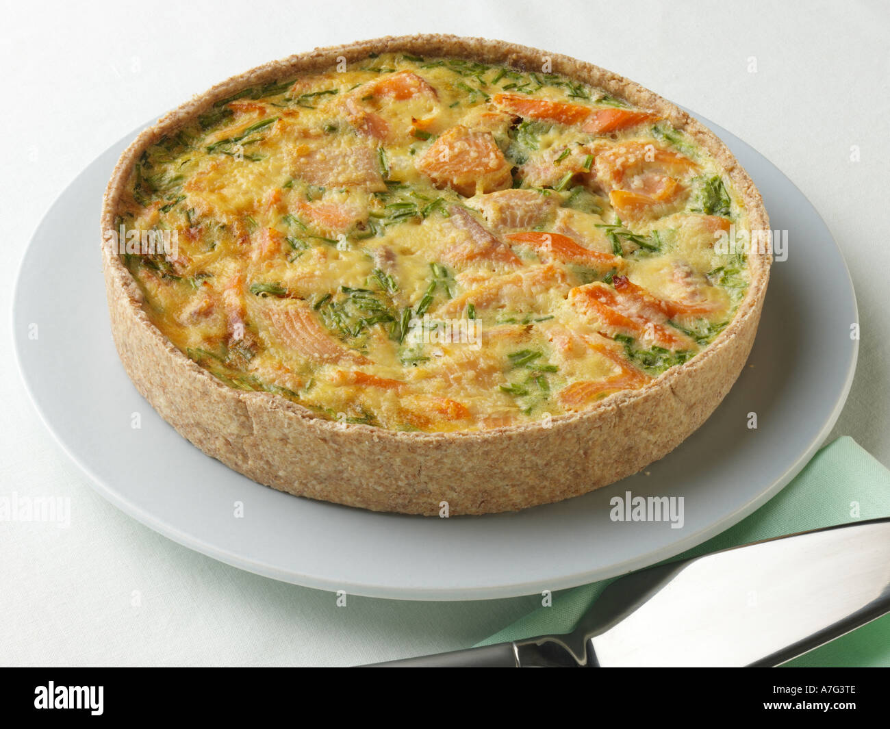 Family sized home baked smoked trout leek quiche hires stock