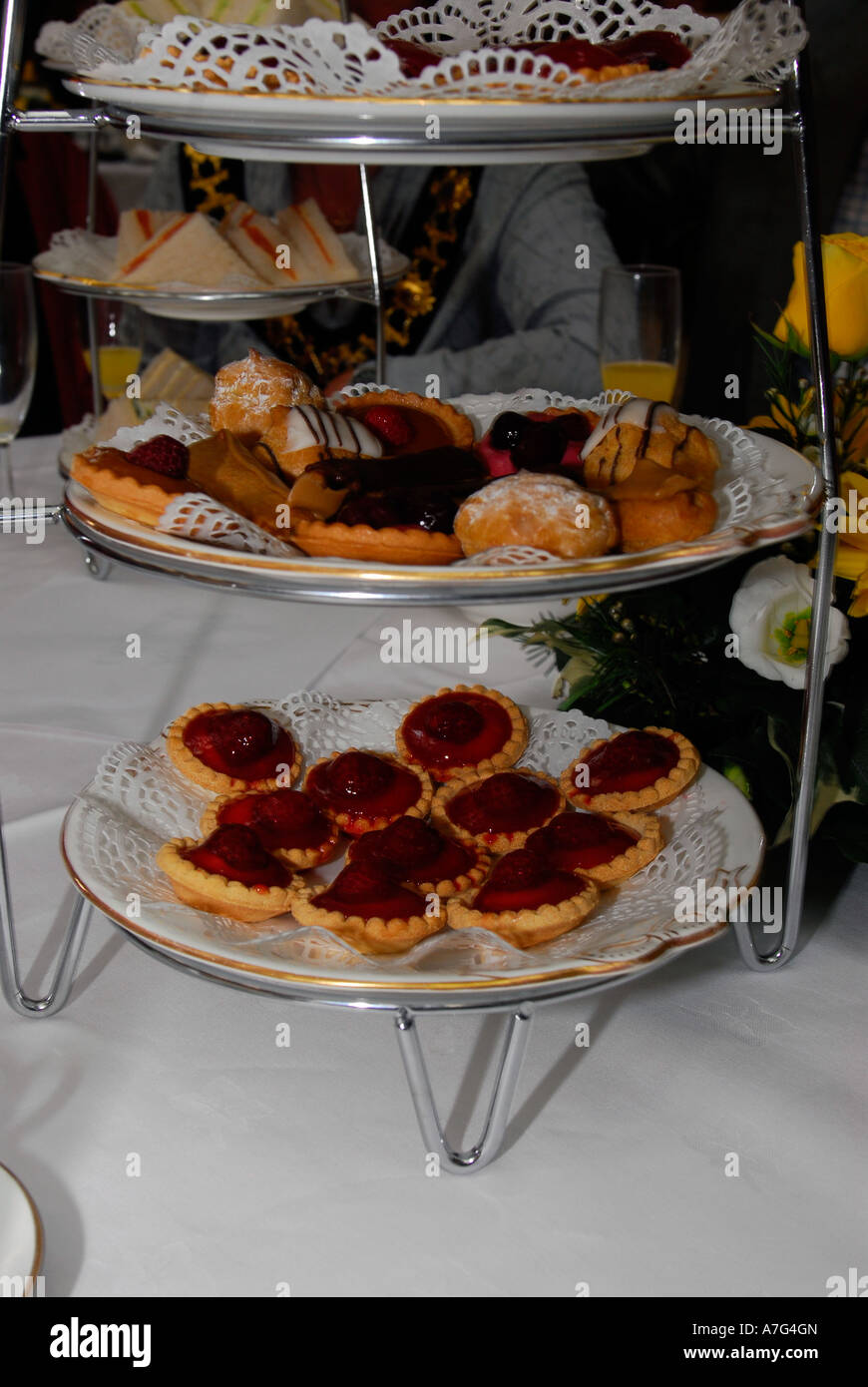 Sandwiches and cakes on table at a Tea Dance for the elderly