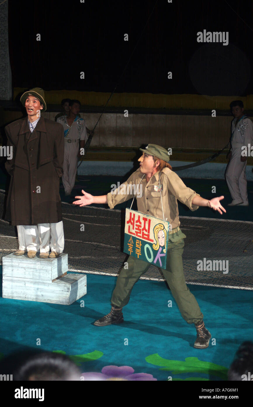 At the circus in Pyongyang, North Korea instead of a clown the audience laughs at the 'stupid' drunk American. Stock Photo