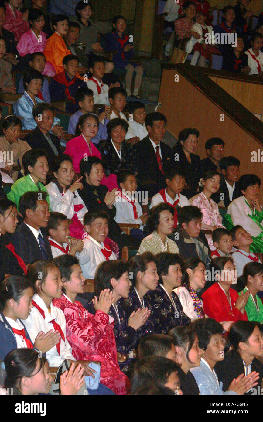 North Koreans sit in the audience and watch the Circus in Pyongyang, North Korea. Stock Photo