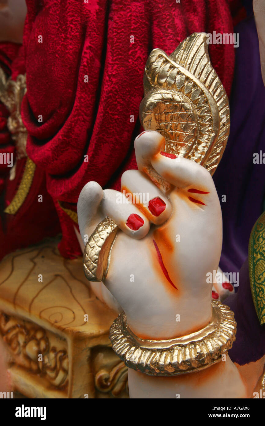 SSK76328 One of the four hand of the idol of Lord Ganesh holding lotus